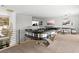Upstairs game room featuring custom poker table and sleek modern design at 507 Serenity Point Dr, Henderson, NV 89012