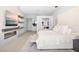 Serene primary bedroom boasts a fireplace, TV, ensuite bathroom and a neutral color palette at 507 Serenity Point Dr, Henderson, NV 89012