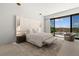 Serene main bedroom with sliding glass doors to a pool and mountain view at 507 Serenity Point Dr, Henderson, NV 89012