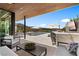 Outdoor living space with pool, seating, bar, grill, and beautiful views at 507 Serenity Point Dr, Henderson, NV 89012