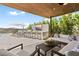 Inviting outdoor area with lounge chairs, kitchen and grill, with gorgeous views at 507 Serenity Point Dr, Henderson, NV 89012