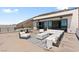 Upscale rooftop patio featuring stylish outdoor furniture and a ping pong table at 507 Serenity Point Dr, Henderson, NV 89012