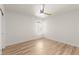 Bedroom with light wood flooring, white walls, and a ceiling fan at 5157 Future Dr, Las Vegas, NV 89130