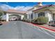 Beautiful community entrance with porte cochere and elegant architecture at 5157 Future Dr, Las Vegas, NV 89130