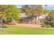 Charming single-story home with mature trees and a well-maintained lawn at 5157 Future Dr, Las Vegas, NV 89130