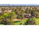 Panoramic aerial view of a home on a lush green golf course community at 5157 Future Dr, Las Vegas, NV 89130