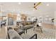 Open-concept living area with spacious design, modern decor, and seamless flow into the kitchen and dining areas at 5157 Future Dr, Las Vegas, NV 89130