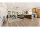 Open floor plan with living, kitchen and dining areas, hardwood floors and recessed lighting at 5157 Future Dr, Las Vegas, NV 89130