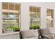 Sunlit living room featuring large windows offering views of the outdoor scenery at 5157 Future Dr, Las Vegas, NV 89130