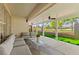 Covered patio showcasing an outdoor living area, ceiling fans, and views of the backyard at 5157 Future Dr, Las Vegas, NV 89130
