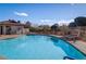 Inviting community pool with comfortable lounge chairs for relaxation and recreation at 5157 Future Dr, Las Vegas, NV 89130
