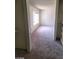 Spacious carpeted bedroom with neutral walls and window for ample light at 5243 Sunnywood Dr, Las Vegas, NV 89120