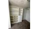 A closet with built-in shelving and drawers at 5243 Sunnywood Dr, Las Vegas, NV 89120