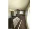 A large living room space with lots of natural light and a ceiling fan at 5243 Sunnywood Dr, Las Vegas, NV 89120