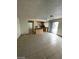 Living room and kitchen area with tile flooring and lots of natural light at 5243 Sunnywood Dr, Las Vegas, NV 89120