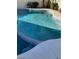 Sparkling blue pool features mosaic tile details and inviting steps for easy access at 5243 Sunnywood Dr, Las Vegas, NV 89120