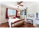 Stylish bedroom featuring unique decor, wood floors, a vanity, and great natural light at 5505 Reiter Ave, Las Vegas, NV 89108