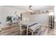 Traditional dining room with wood floors, large table, and natural light at 5505 Reiter Ave, Las Vegas, NV 89108