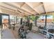 Covered patio featuring exercise equipment and natural light, perfect for a home gym at 5505 Reiter Ave, Las Vegas, NV 89108