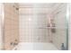 Clean shower with a shower-tub combination and glass doors at 5505 Reiter Ave, Las Vegas, NV 89108