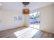 Bright room with sliding glass doors leading to a minimal backyard at 5653 Artesia Lake Ct, Las Vegas, NV 89118