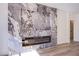 Contemporary fireplace with marble surround, providing a focal point in the living space at 5653 Artesia Lake Ct, Las Vegas, NV 89118