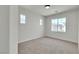 Bright bedroom with large windows and neutral walls creating a serene atmosphere at 715 Taliput Palm Pl, Henderson, NV 89011