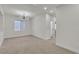 Bonus room features carpet flooring, recessed lighting and neutral color palette at 715 Taliput Palm Pl, Henderson, NV 89011