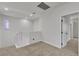 Bright hallway area with carpet flooring and neutral color palette at 715 Taliput Palm Pl, Henderson, NV 89011