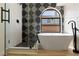 Modern bathroom with soaking tub, shower, and stylish fixtures at 7221 W Washington Ave, Las Vegas, NV 89128