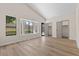 Bedroom featuring wood-style floors, natural light, and closet at 7221 W Washington Ave, Las Vegas, NV 89128