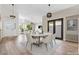 Bright dining area with wood flooring and ample natural light, ideal for Gathering meals at 7221 W Washington Ave, Las Vegas, NV 89128