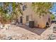 Backyard featuring a patio area and a well-maintained lawn at 728 Twilight Blue Ave, North Las Vegas, NV 89032