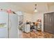 Bright eat-in kitchen area with tile floors and white appliances; perfect for a casual meal at 728 Twilight Blue Ave, North Las Vegas, NV 89032