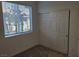 This bedroom has carpet and a closet with natural light from a window at 7332 N Decatur Blvd # 2, North Las Vegas, NV 89084