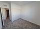 Carpeted bedroom with a closet and bright natural light at 7332 N Decatur Blvd # 2, North Las Vegas, NV 89084