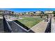 Fenced dog park area with green space, benches, and pet-friendly amenities for residents at 7332 N Decatur Blvd # 2, North Las Vegas, NV 89084
