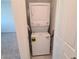Efficient laundry room features a stacked washer and dryer and neutral tiling at 7332 N Decatur Blvd # 2, North Las Vegas, NV 89084