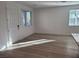 Bright living room featuring light wood floors, modern windows, and a clean, minimalist design at 7332 N Decatur Blvd # 2, North Las Vegas, NV 89084