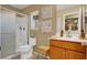 Bright bathroom featuring a glass-door shower, vanity and medicine cabinet at 759 Star Apple Ln, Las Vegas, NV 89178