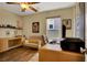 Bedroom featuring built-in desk, warm colors, and ample natural light at 759 Star Apple Ln, Las Vegas, NV 89178