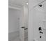 Bathroom with shower and tub combination, showcasing modern fixtures and clean design at 7977 Texas Hills St, Las Vegas, NV 89113
