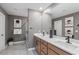 This primary bathroom showcases a double sink vanity, modern fixtures, and stylish decor at 7977 Texas Hills St, Las Vegas, NV 89113