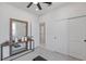 Bright bedroom with a modern decor, large mirror, closet, and a cozy atmosphere at 7977 Texas Hills St, Las Vegas, NV 89113