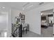 Open hallway and desk area leading to a bedroom, offering a flexible space within the home at 7977 Texas Hills St, Las Vegas, NV 89113