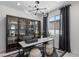 Stylish office space with unique decor, modern lighting fixture, and sleek furniture at 7977 Texas Hills St, Las Vegas, NV 89113