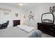 Bedroom with neutral walls, carpeted floors, and a ceiling fan at 8121 Eagle Clan Ct, Las Vegas, NV 89131