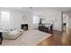 Bright living room with hardwood floors, dining area, and neutral decor at 8121 Eagle Clan Ct, Las Vegas, NV 89131