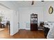 Well-lit office area with hardwood floors, and access to the living room at 8121 Eagle Clan Ct, Las Vegas, NV 89131