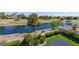 Tranquil backyard view of a serene lake and lush golf course at 8196 Horseshoe Bend Ln, Las Vegas, NV 89113